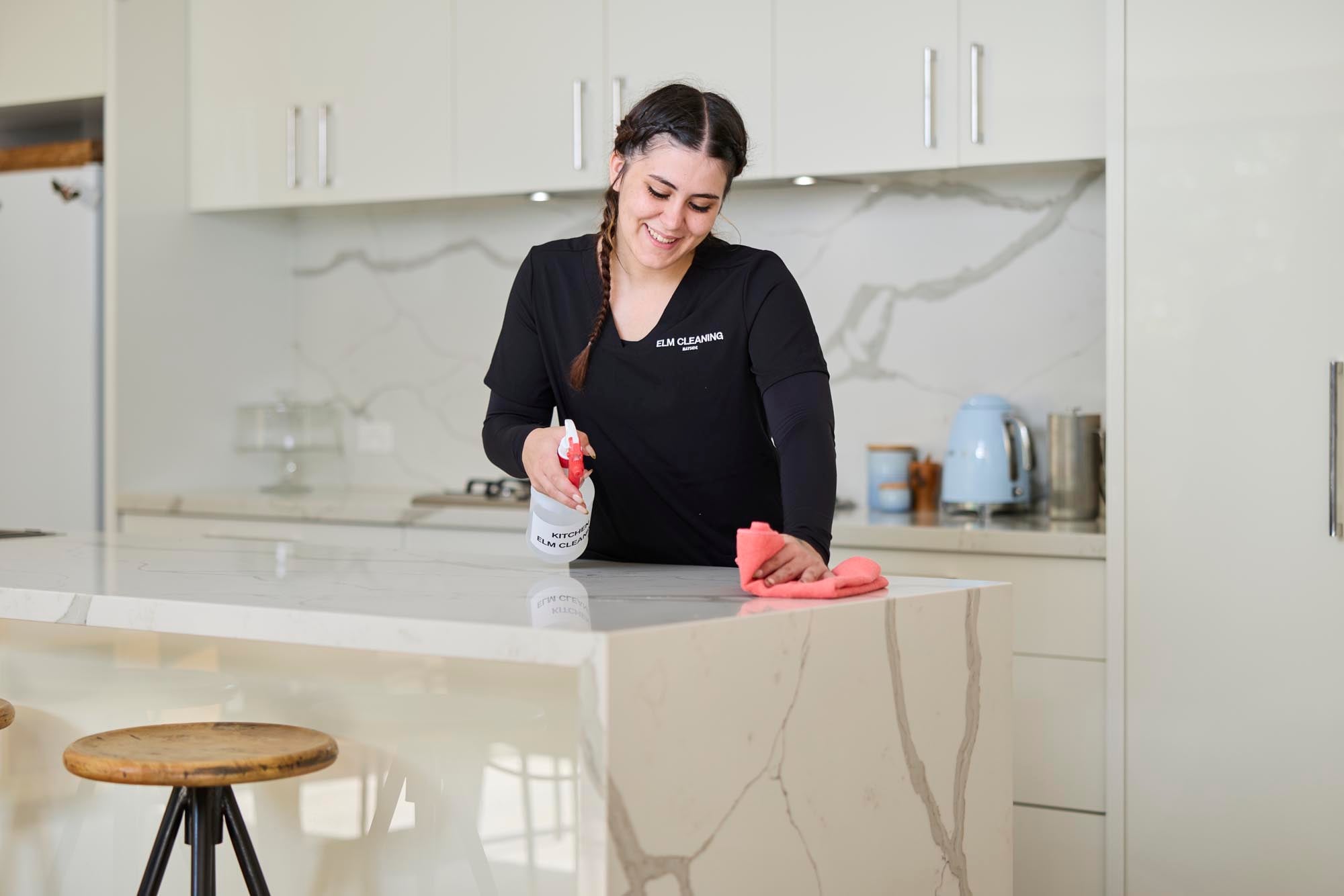 Support worker assisting in a kitchen environment